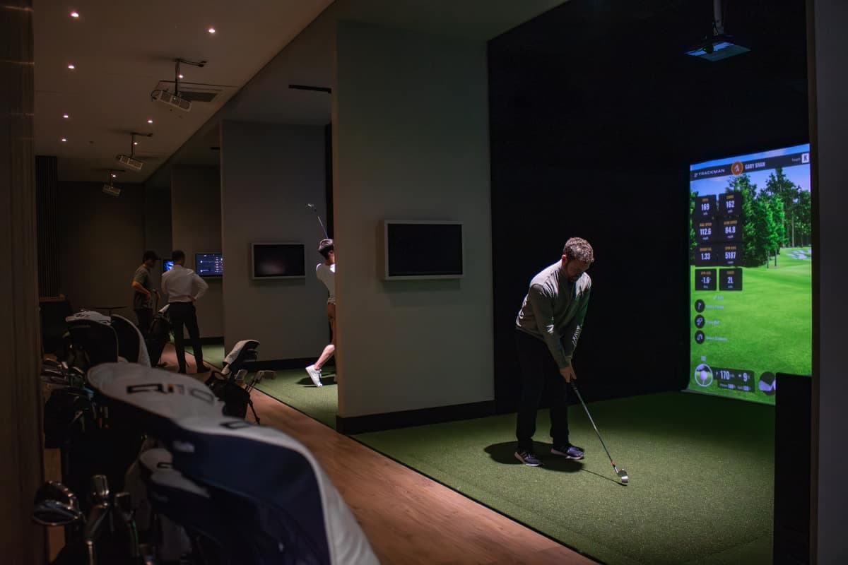 A player addressing the ball at Caddi Club Waterloo