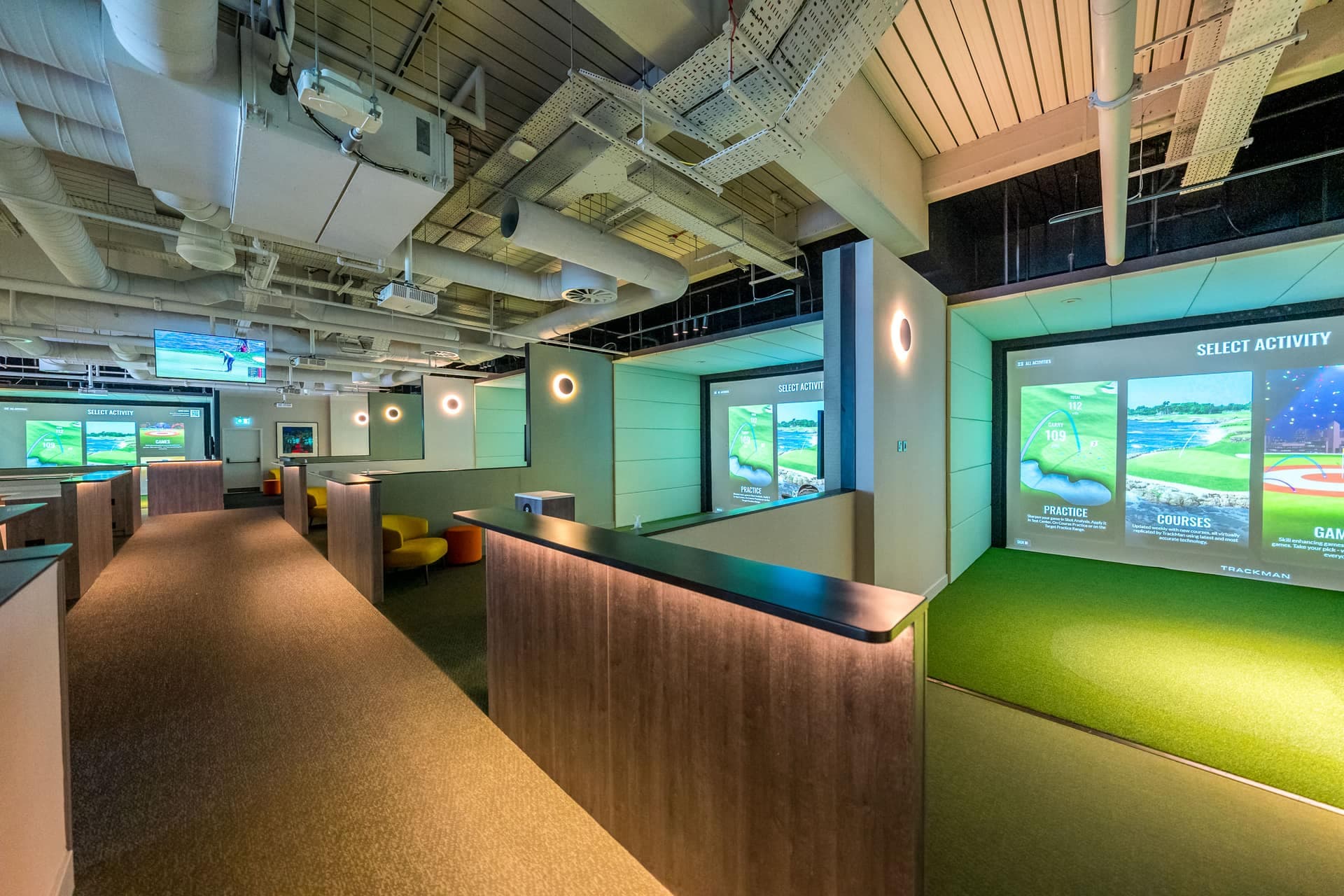 The simulator bays at Caddi Club Wimbledon
