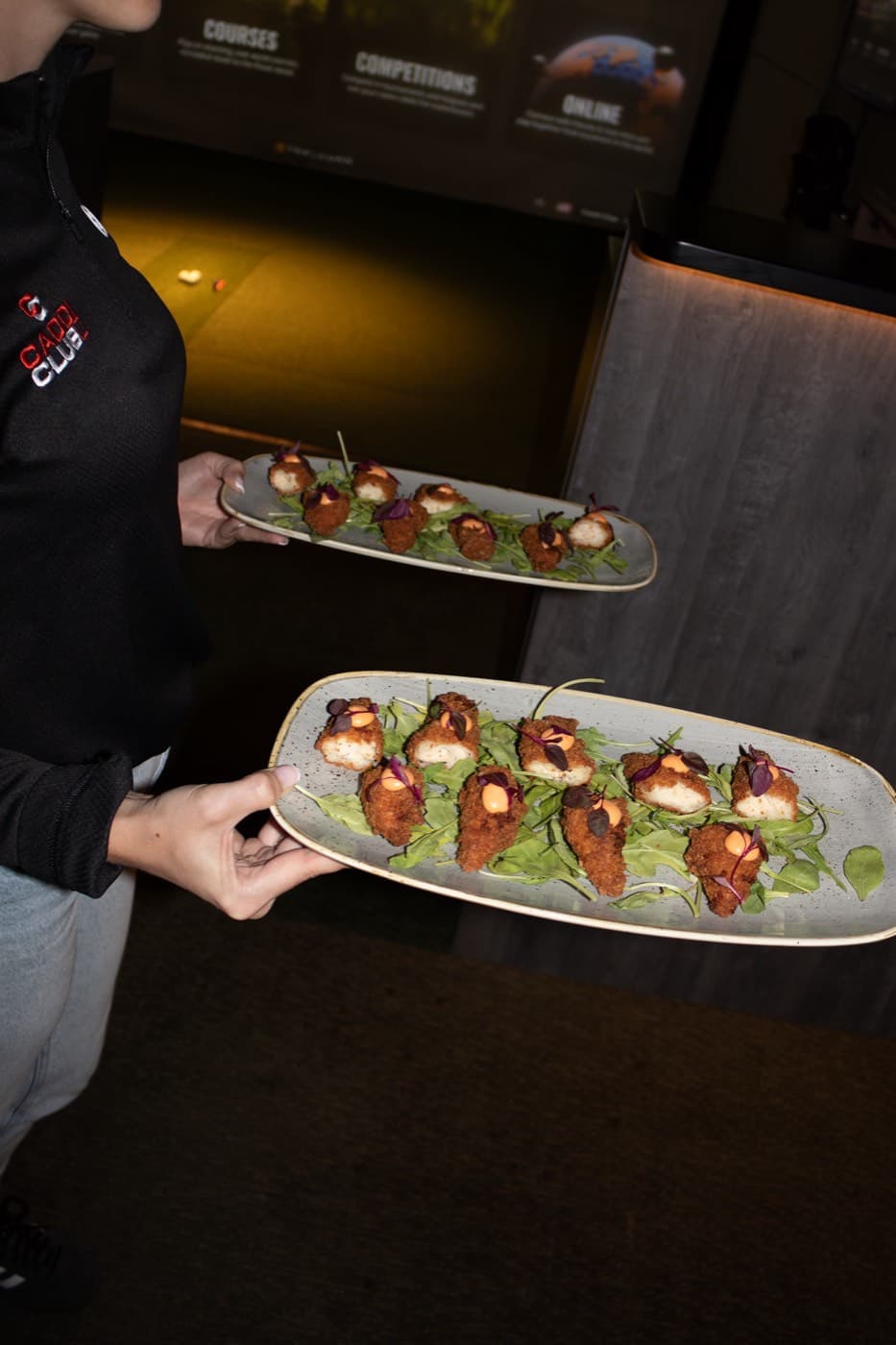 Canapés served on trays at Caddi Club Wimbledon